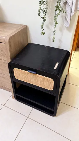Black bedside cabinet with woven front