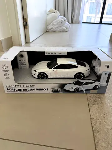 Moving Sale | Sharper Image Porsche Taycan Turbo S RC Car (New, Sealed)