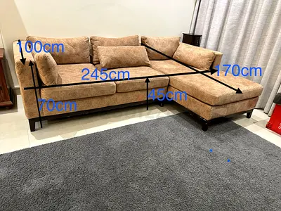 L-shaped faux-suede sofa (245cm) with chaise - good condition