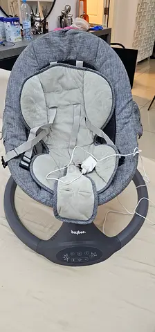 Gray Baby Swing/Rocker with Vibration and Harness , music  excellent conditions