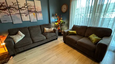 كنب 3 مقاعد + كنب مقعدين بحالة ممتارة Three + Two seater grey fabric sofa in excellent condition