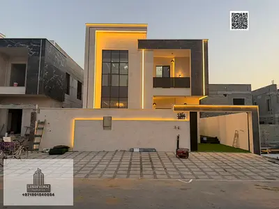 Villa for sale in Ajman, Al Helio area. 4 master bedrooms, majlis, living room, and maid's room. Ba