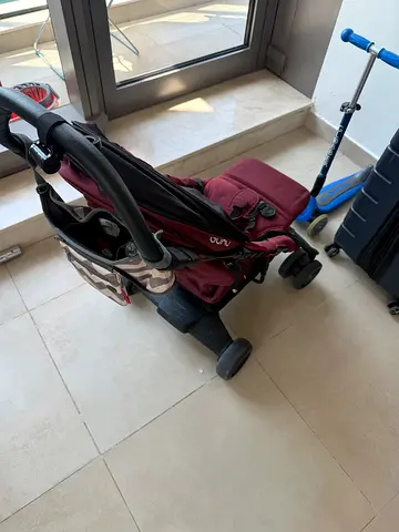 Lightweight Nuna Stroller in Burgundy — Good Condition