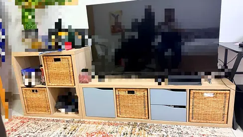 IKEA Kallax-style TV unit and storage cubes with wicker baskets - light wood