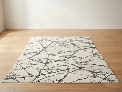 Modern abstract grey and cream area rug - excellent condition