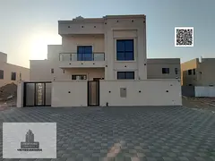 Villa for sale in Ajman, Al Helio area. 4 master bedrooms, majlis, living room, and maid's room. Ban