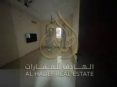 A modern room and lounge in Al Bu Tinah with an open view and a balcony
