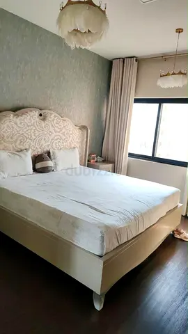 Queen upholstered bed with headboard in good condition