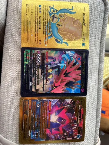 Three Holographic Pokémon V Cards — Omastar V, Zapdos V, Eternatus V (Collector Grade)