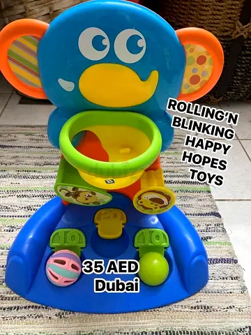 Baby paying Hoops toy
