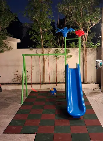 Kids outdoor swing set with slide and rubber matting - good condition