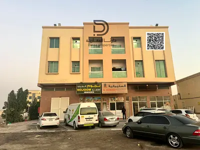 بناية تجارية سكنية للبيع في الجرف الصناعية 2 عجمان، أرضي وطابقين، 4 محلات و14 شقة، دخل سنوي 400 ألف درهم قابل للزيادة، السعر 5.5 مليون جنيه.