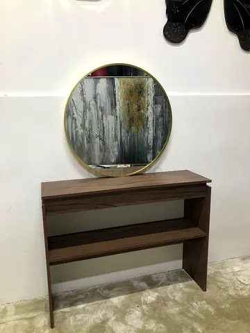 Console table with a lower shelf with gold mirror