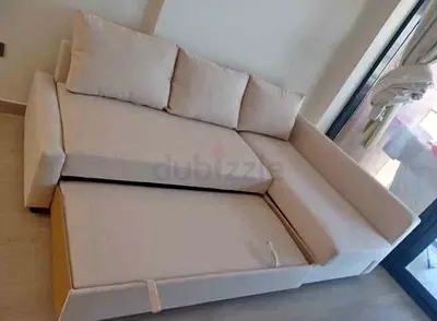 Ikea L shape frighten beige color sofa with storage space