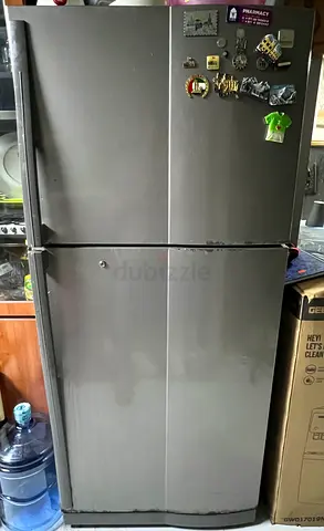 Used double-door refrigerator in working condition - grey