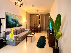 Luxury, brand new apartment. Features one bedroom, a living room, and an open balcony. Located in Aj