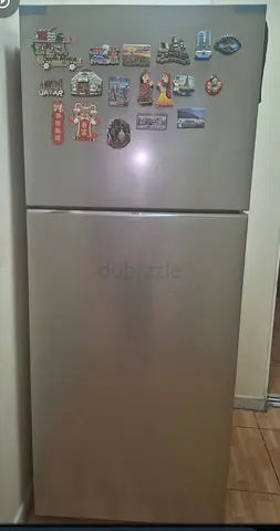 Good condition stainless steel top-freezer refrigerator - 2 doors