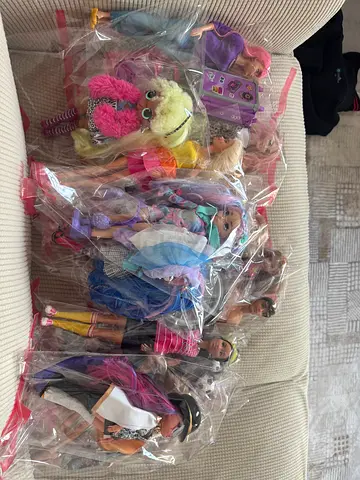 A lot of Barbie dolls and toys for sale
