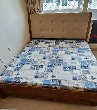 Queen wooden bed frame with medicated mattress - good condition