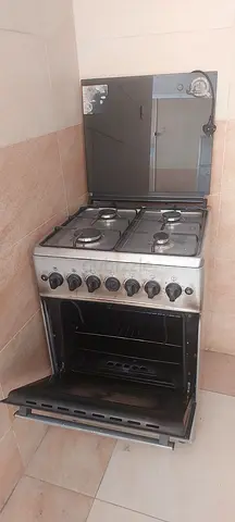 Used freestanding stainless steel gas oven with 4-burner hob (working condition)