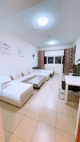 Furnished One-bedroom apartment for monthly rent in Ajman – Al Rashidiya – Ajman One Towers | Stylish furnishings | Includes bills and internet