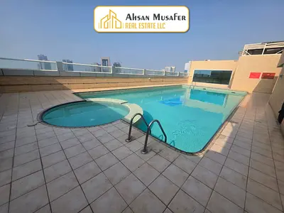 ONE MONTH FREE+COMMISSION//GYM POOL KIDS PLAY AREA FREE//PRIME LOCATION//+10DAYS FREE+2BHK WITH THREE WASHROOMS AL TAWUUN SHARJAH