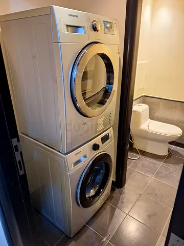 Stacked Samsung Washer and Dryer Set - Front Load, Good Condition