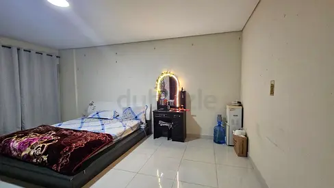 Furnished Master Bedroom, attached bath & balcony available in Bur Dubai Rolla Street for couple