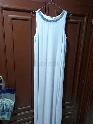 Light purple sleeveless long evening dress with beaded neckline