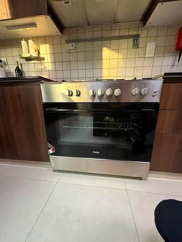 Haier freestanding stainless steel gas oven and hob - excellent condition