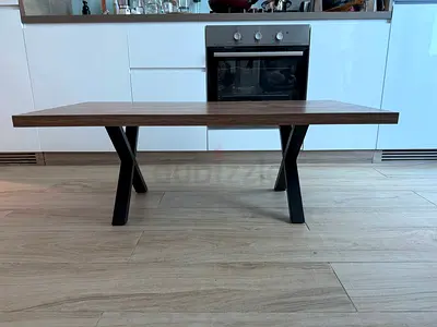 Modern walnut coffee table with X-shaped metal legs. Size 60x120cm height 40cm