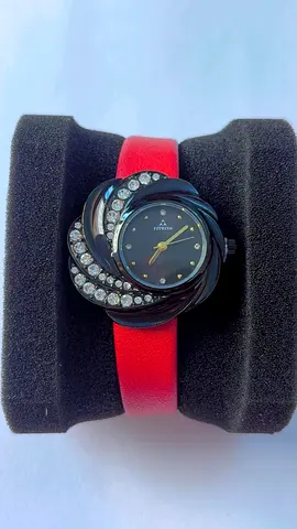 Red leather strap women's watch with decorative crystal swirl face