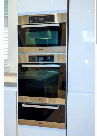 Miele Built-in Stainless Steel Electric Oven with Warming Drawer microwave