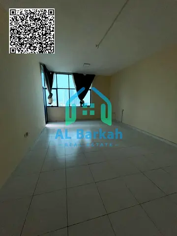 شقة غرفتين وصالة للبيع في أبراج فالكون عجمان بإطلالة بحرية وباركن خاص