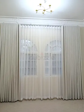 Full set of beige fabric curtains with sheer panels - ready to hang