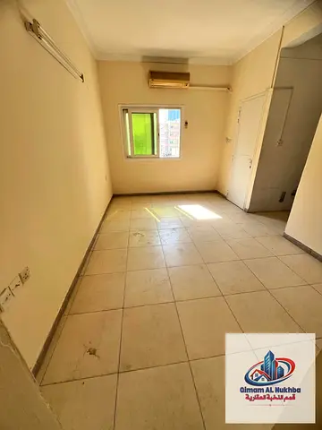 Spacious studio for rent in Al Nabba Sharjah with a separate kitchen near Al Madina Hypermarket Lulu Market shops restaurants and essential services i