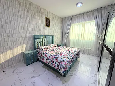 Furnished One-bedroom apartment (with living room) for monthly rent in Ajman - Al Rashidiya ✔️ Includes bills and internet | a gym, pool, parking.