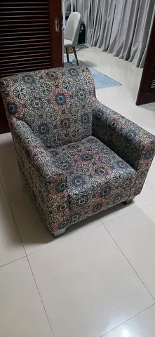 Single upholstered accent armchair in patterned fabric - good condition