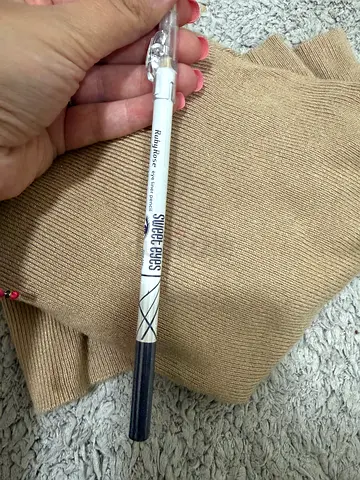 NEW purple eye pencil with sharpener