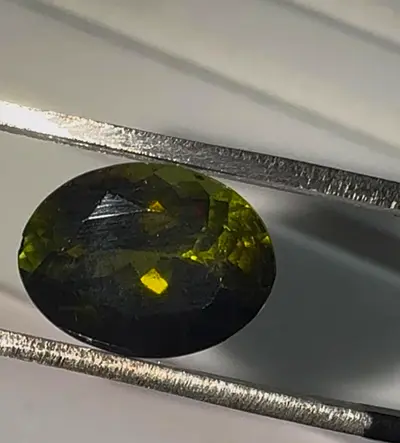 Oval faceted green Tourmaline gemstone - loose cut stone