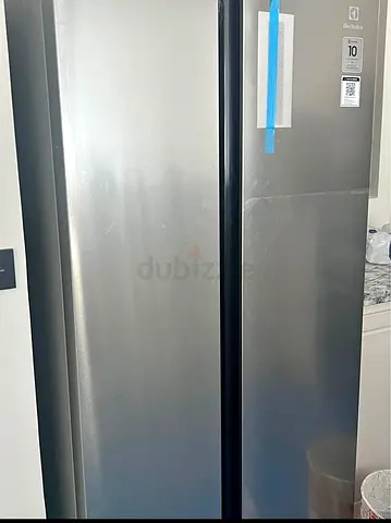 Electrolux Side-by-Side Refrigerator - Stainless Steel, Brand new Condition