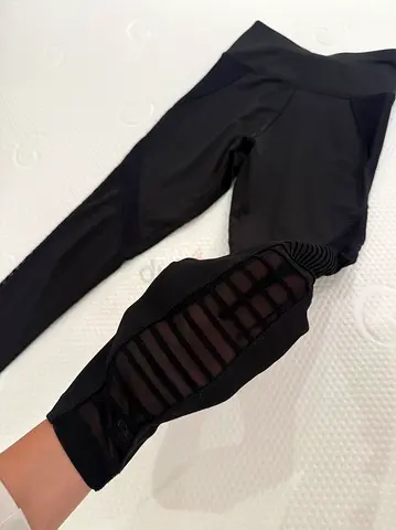 Black women's workout leggings OYSHO with mesh panel detail, size S