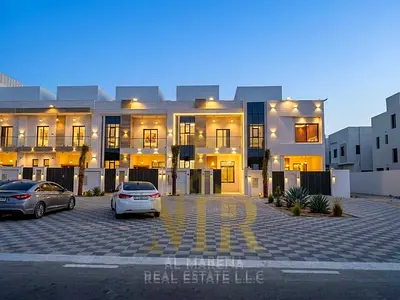 For sale: an exceptional villa in Al Helio 2, located directly on the main road. It features a mode