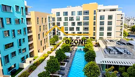 Elegant Pool-Facing 1BR | Bright Interiors | Balcony | Uptown Al Zahia