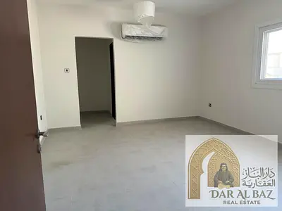 Villa for rent in Al Suyoh, featuring 4 bedrooms, a majlis, a living area, and an outdoor garden; annual rent is 120,000 for UAE and GCC nationals.