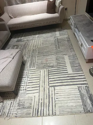 Modern grey and cream geometric area rug, excellent condition