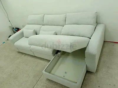 Ikea gray Eskilstuna sofabed with storage space