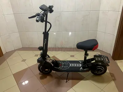 Electric Scooter with Seat - Dual Motor, Good Condition