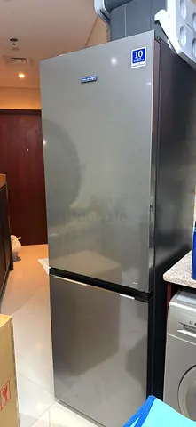 Bottom freezer refrigerator neat and clean condition