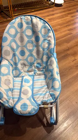 Lightweight blue baby bouncer seat in good condition